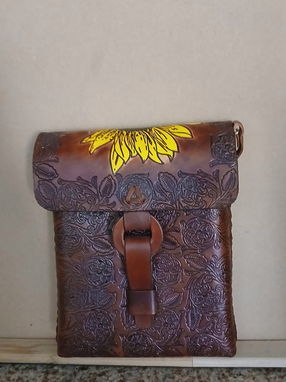Handcrafted Brown Tooled Leather Crossbody Bag with Yellow Accent